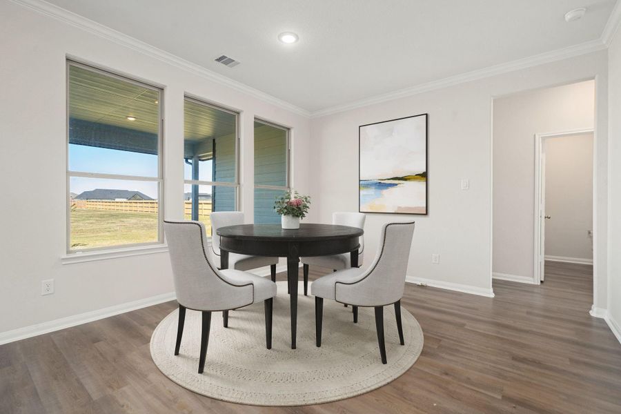 This open and airy living space is filled with natural light streaming through large windows, showcasing the clean, modern design. A neutral color palette and recessed lighting enhance the bright, welcoming atmosphere, while the seamless flow to the kitchen and dining areas creates a spacious layout perfect for everyday living and entertaining. This open and airy living space is filled with natural light streaming through large windows, showcasing the clean, modern design. A neutral color palette and recessed lighting enhance the bright, welcoming atmosphere, while the seamless flow to the kitchen and dining areas creates a spacious layout perfect for everyday living and entertaining.