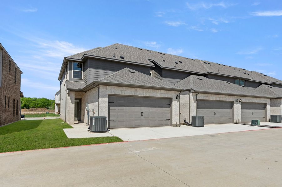 Front exterior of a new home in Sanger Circle – Townhomes, Sanger, TX, highlighting curb appeal (Image 28).