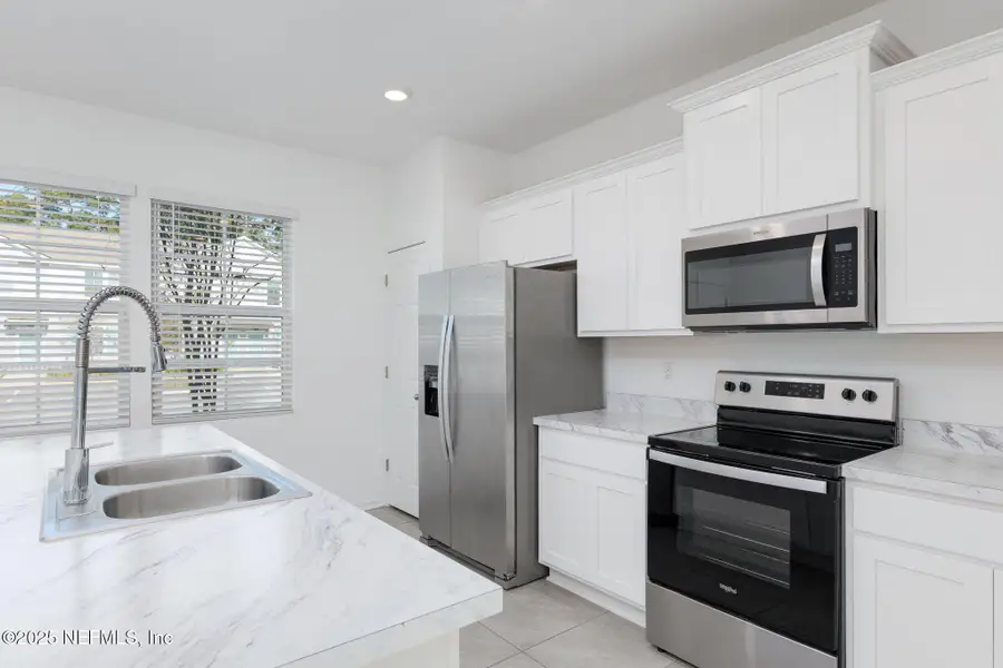 Furnished interior view inside a new home in Equinox East, Jacksonville (Image 5).
