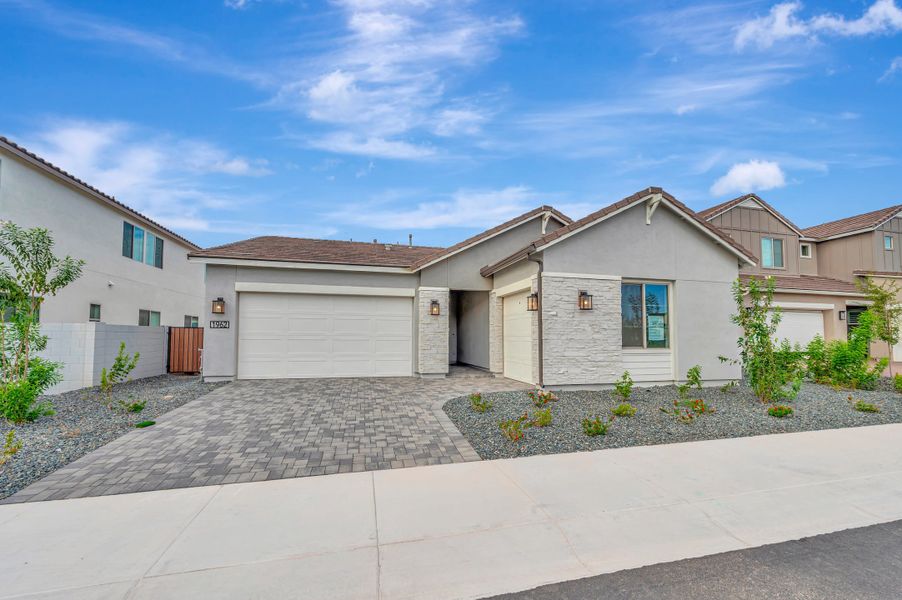 Front exterior of a new home in Soleo, San Tan Valley, AZ, highlighting curb appeal (Image 21).