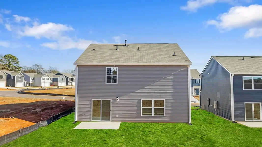 Exterior details and patio area of a home in Trailside Run, Spartanburg (Image 3). Exterior details and patio area of a home in Trailside Run, Spartanburg (Image 3).