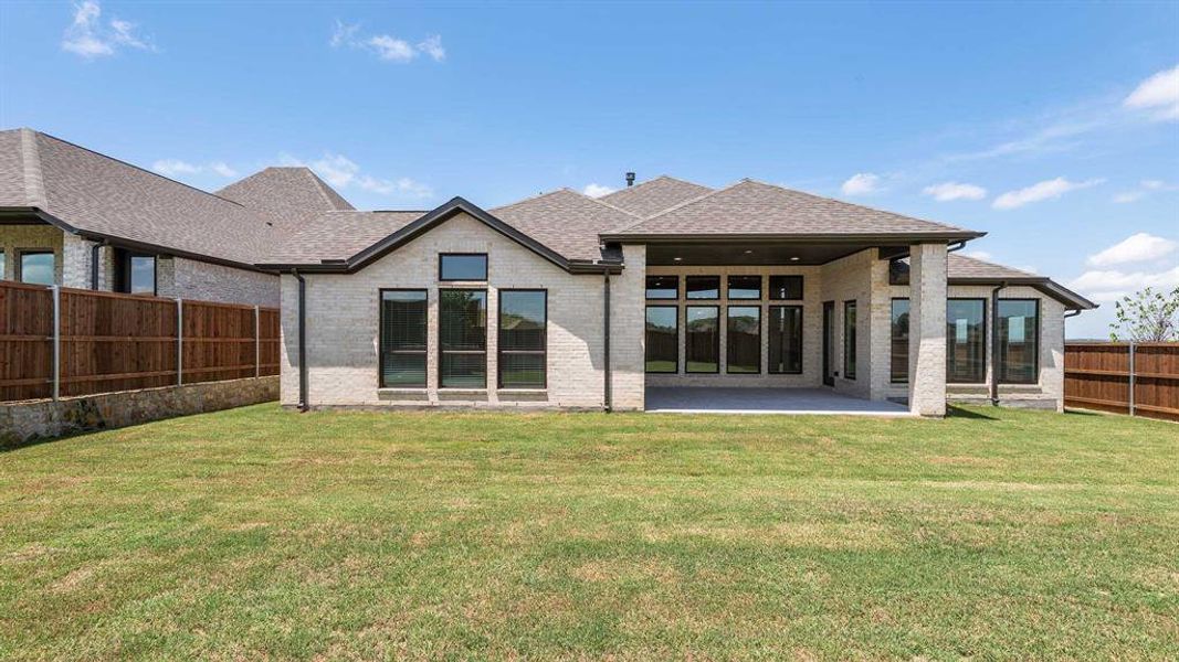 Front exterior of a new home in Talon Hills 60'/70', Fort Worth, TX, highlighting curb appeal (Image 16). Front exterior of a new home in Talon Hills 60'/70', Fort Worth, TX, highlighting curb appeal (Image 16).