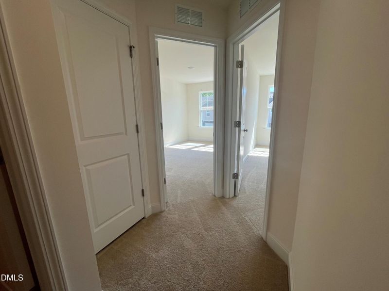 Hallway leading to secondary bedrooms