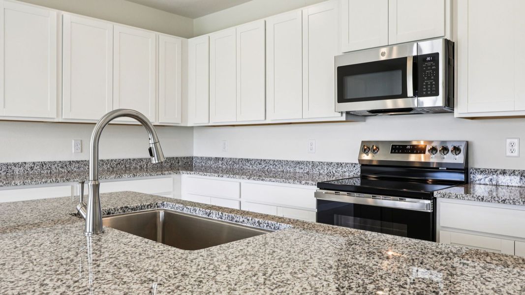 Representative furnished interior of a home built from the Baker by DRB Homes in Liberty Trace, Haines City (Image 8).