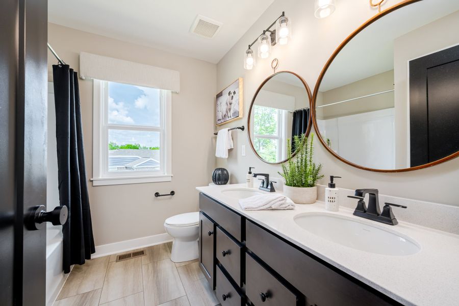 Representative furnished interior of a home built from the Finley by Fischer Homes in Twin Lakes, Hoschton (Image 40).