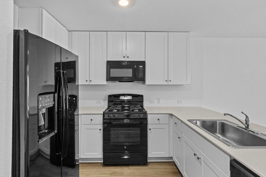 Furnished interior view inside a new home in Sunset Oaks, San Marcos (Image 7).