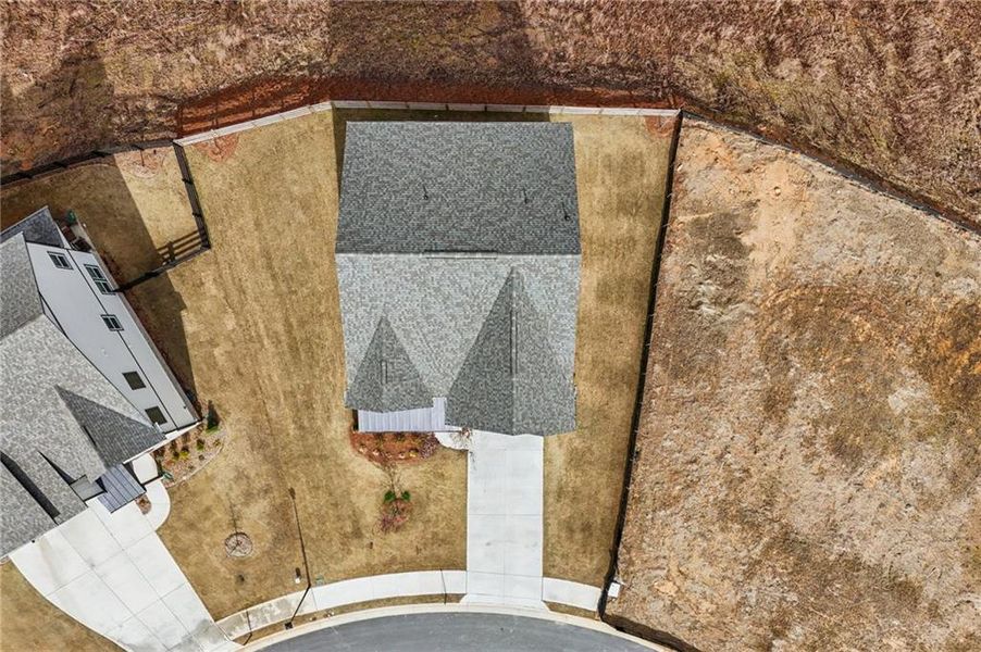 Exterior details and patio area of a home in Tiberon Woods, Cumming (Image 33). Exterior details and patio area of a home in Tiberon Woods, Cumming (Image 33).