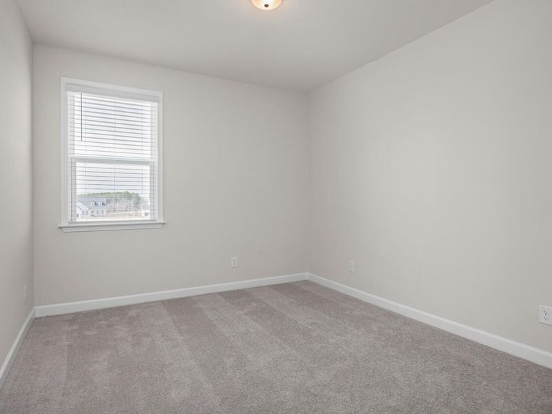 Spacious, unfurnished interior of a new home in Tobacco Road, Angier (Image 19).