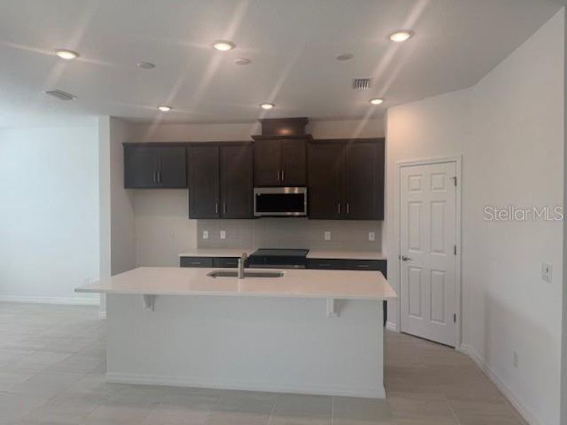 Furnished interior view inside a new home in Brack Ranch, St. Cloud (Image 5).