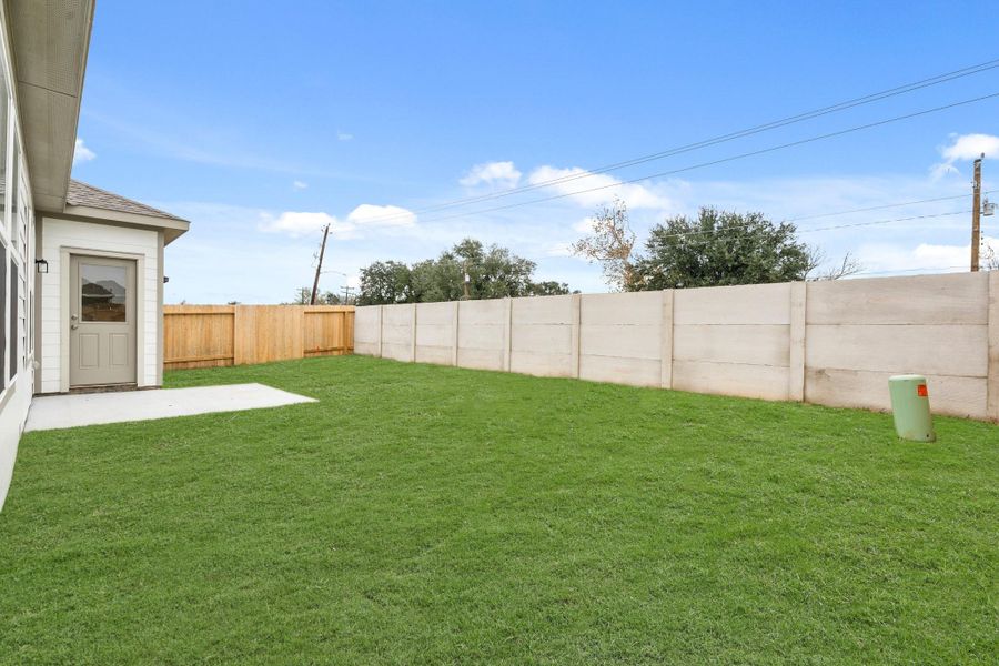 Exterior details and patio area of a home in Trails at Woodhaven, La Marque (Image 4).