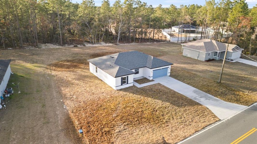 Front exterior of a new home in , Ocala, FL, highlighting curb appeal (Image 19).