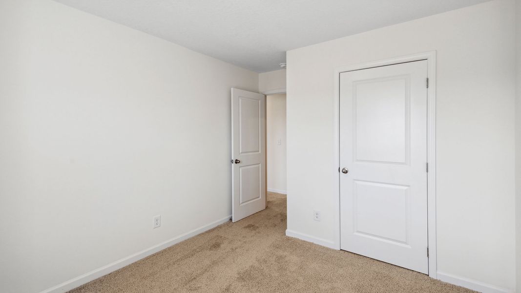 Spacious, unfurnished interior of a new home in The Hideaway at Fox Meadows, Bluff City (Image 26).
