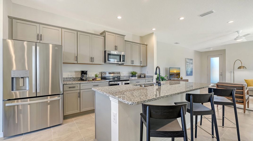 Furnished interior view inside a new home in SkySail, Naples (Image 9).
