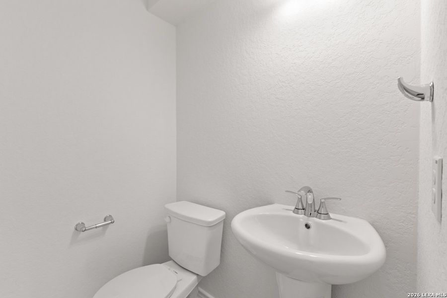 Furnished interior view inside a new home in Spanish Trails Villas, San Antonio (Image 11).