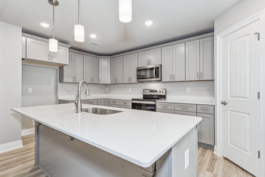 Representative furnished interior of a home built from the The Liberty by Herbst Homes in Prosperity Point, Milton (Image 8).