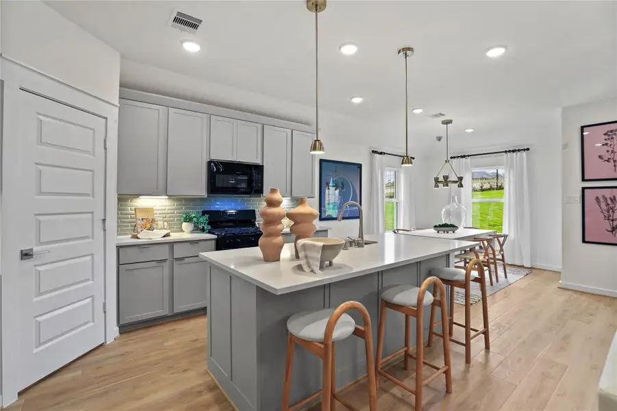 Model home photos of similar floorplans, not pictures of actual home.