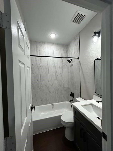 Furnished interior view inside a new home in , Conroe (Image 5).