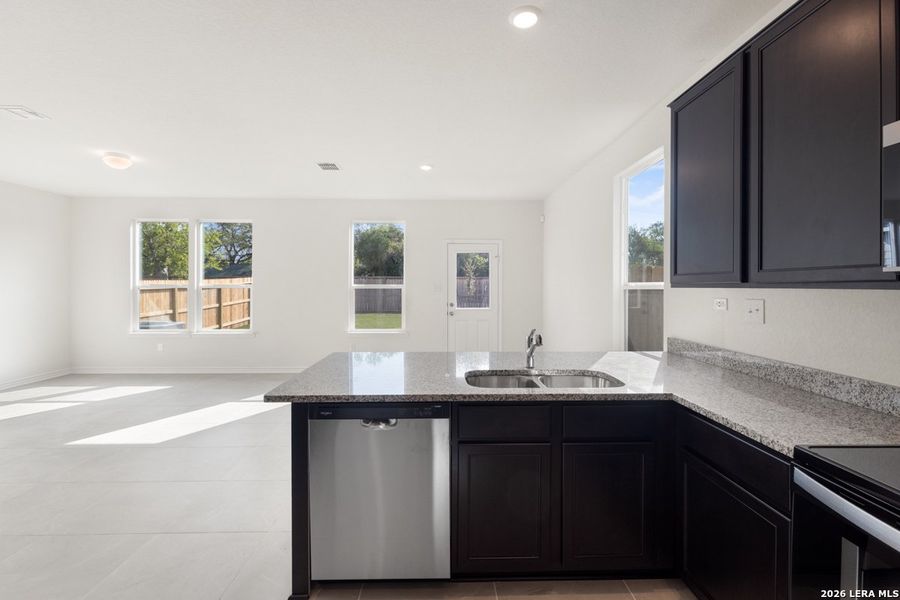Furnished interior view inside a new home in Spanish Trails Villas, San Antonio (Image 13).
