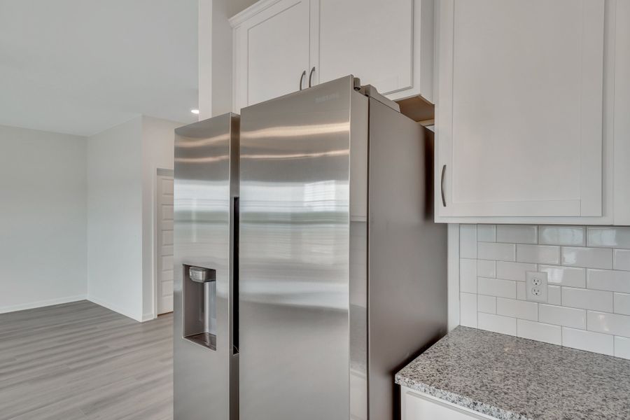 Representative furnished interior of a home built from the The Norman by RTS Homes in Doctor's Creek, Ludowici (Image 11).