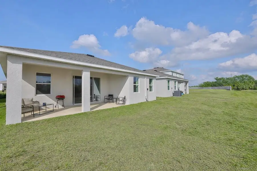 Exterior details and patio area of a home in Silverstone North, Palmetto (Image 3).