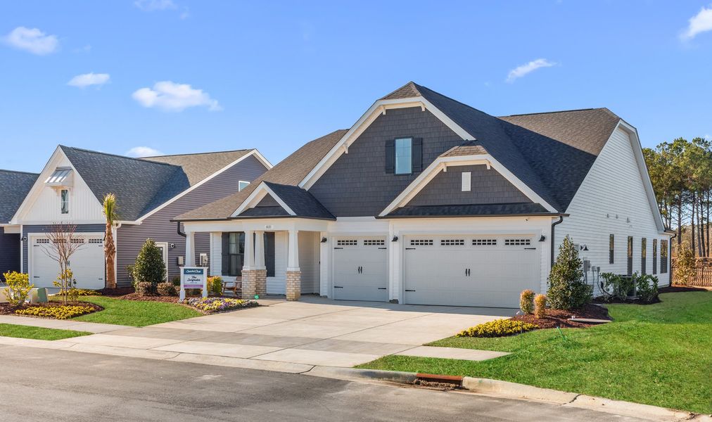 Representative exterior photo of a completed home built from the The Surfrider by Chesapeake Homes in Coastal Club of the Carolinas, Calabash, NC (Image 29).
