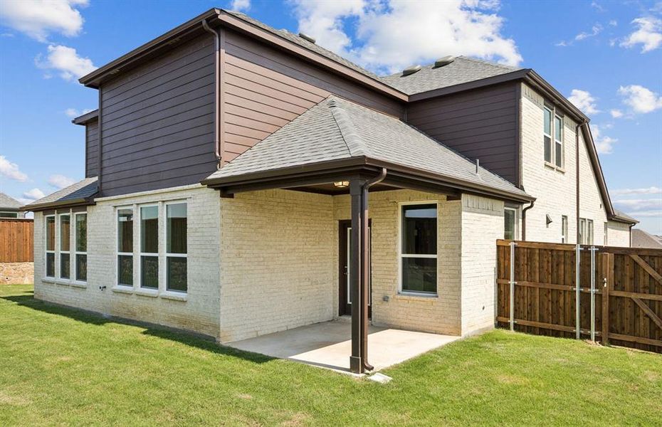 Covered patio with large backyard