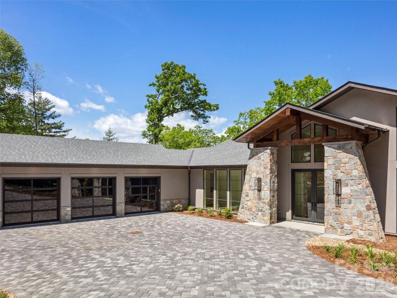 Front exterior of a new home in , Arden, NC, highlighting curb appeal (Image 2).