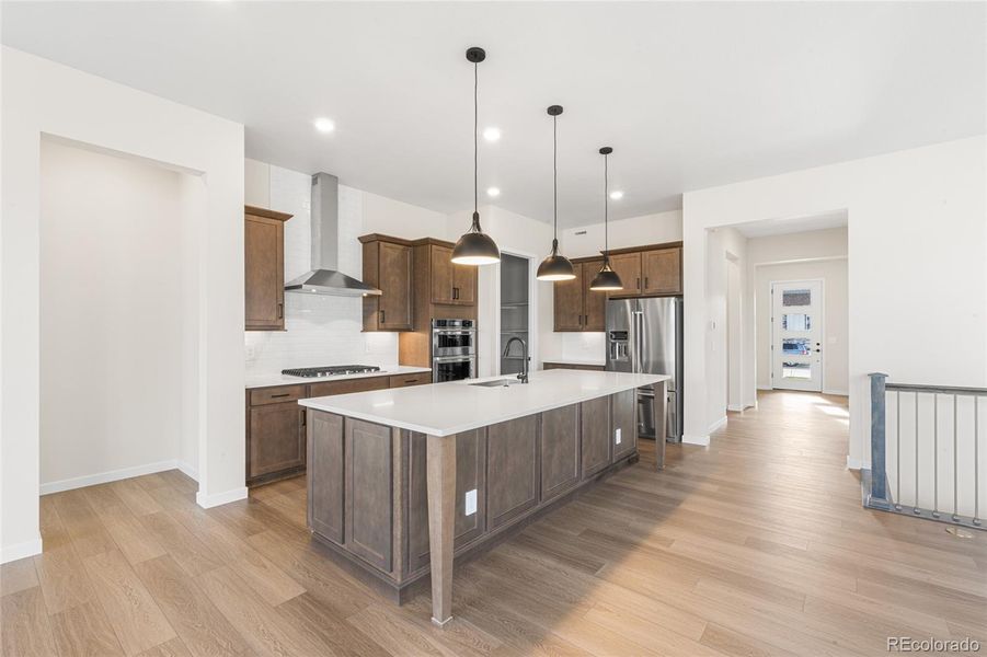Furnished interior view inside a new home in Hilltop at Inspiration, Aurora (Image 10).