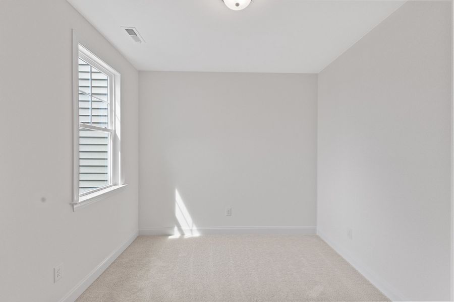 Representative unfurnished interior of a home built from the The Hemlock by RobuckHomes in Kennebec Crossing, Angier (Image 137).