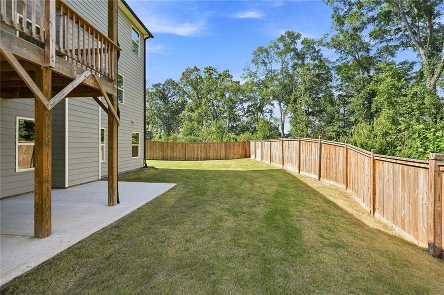 Exterior details and patio area of a home in Little River Falls, Woodstock (Image 25).