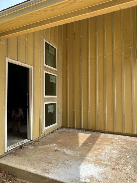 back porch with ceiling fan