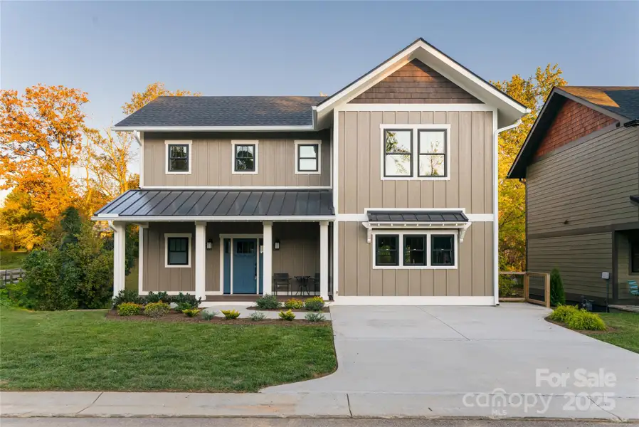 Front exterior of a new home in , Asheville, NC, highlighting curb appeal (Image 1). Front exterior of a new home in , Asheville, NC, highlighting curb appeal (Image 1).