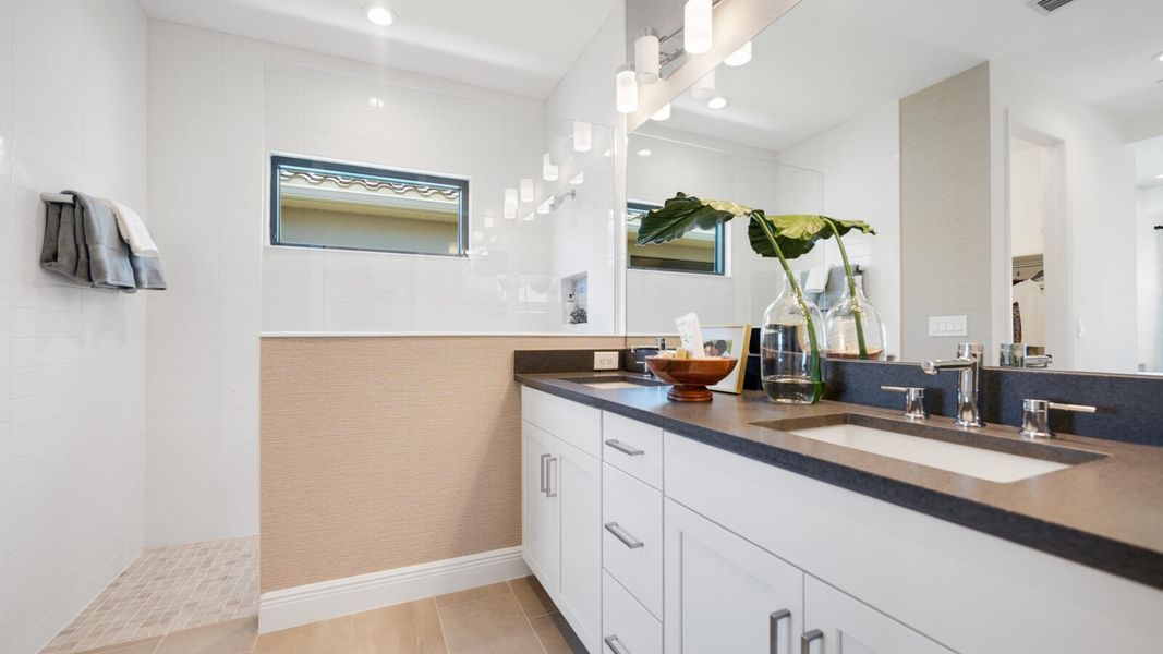 Representative furnished interior of a home built from the Meadow Brook by Neal Communities in SkySail, Naples (Image 16).