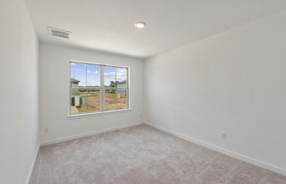 Spacious, unfurnished interior of a new home in Wolf Ranch, Georgetown (Image 20).