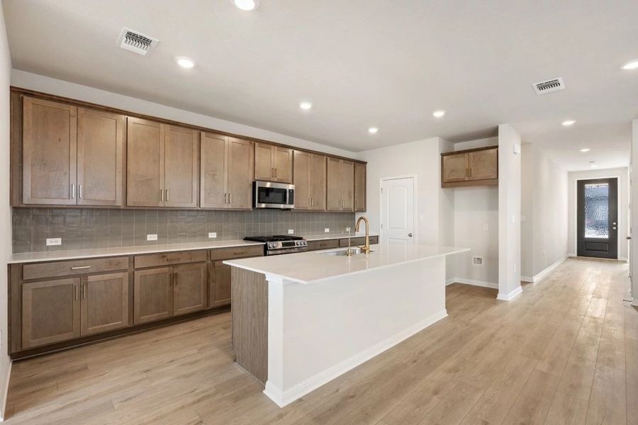 Furnished interior view inside a new home in The Colony, Bastrop (Image 9).