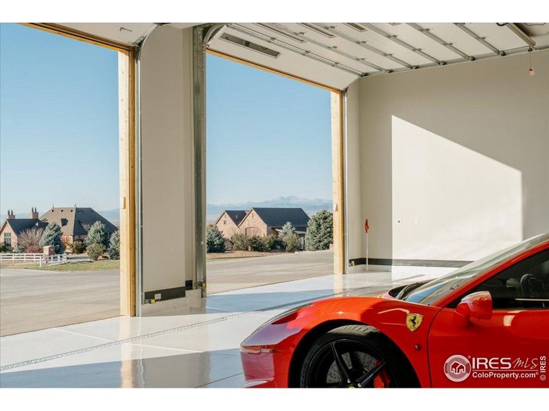 RV/Auto garage w/ 2246sqft, 15' ceiling height, epoxy floors, infloor drain, heated, multiple TV locations, 240Volt, 50amp service, Bathroom, sink