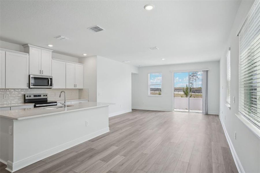 Furnished interior view inside a new home in Cyrene at Minneola - Villas, Montverde (Image 11). Furnished interior view inside a new home in Cyrene at Minneola - Villas, Montverde (Image 11).