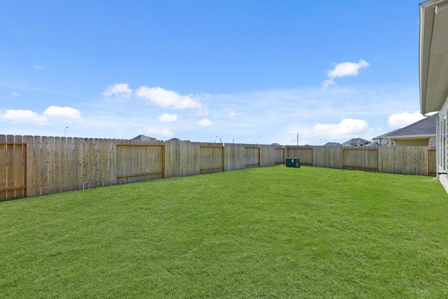 Front exterior of a new home in Briarwood Crossing, Rosenberg, TX, highlighting curb appeal (Image 15).