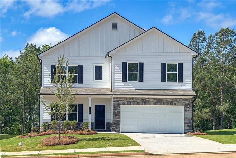 Front exterior of a new home in Evergreen at Lakeside, Temple, GA, highlighting curb appeal (Image 1). Front exterior of a new home in Evergreen at Lakeside, Temple, GA, highlighting curb appeal (Image 1).