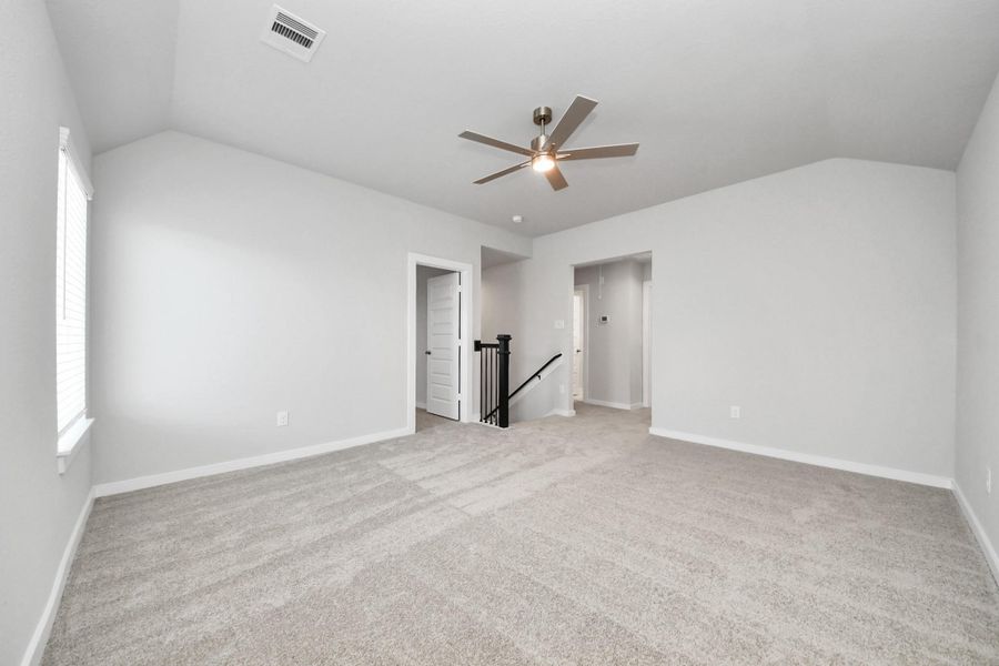 Ascend to relaxation in this fantastic game room! Ideal for both casual gatherings and adult gaming, it boasts plush carpet, lofty ceilings, custom paint, and ample windows for abundant natural light. Sample photo of completed home with similar floor plan. Actual colors and selections may vary. Ascend to relaxation in this fantastic game room! Ideal for both casual gatherings and adult gaming, it boasts plush carpet, lofty ceilings, custom paint, and ample windows for abundant natural light. Sample photo of completed home with similar floor plan. Actual colors and selections may vary.