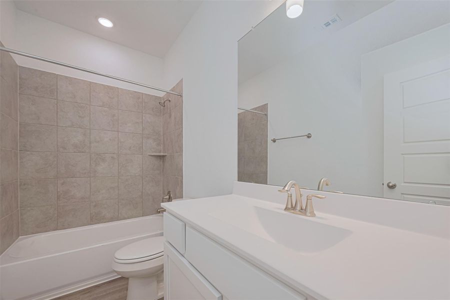 Furnished interior view inside a new home in Sunterra, Katy (Image 13).