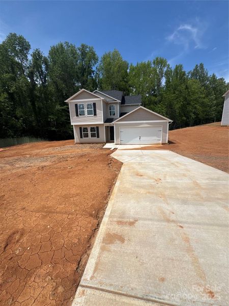 Front exterior of a new home in , Kings Mountain, NC, highlighting curb appeal (Image 1).