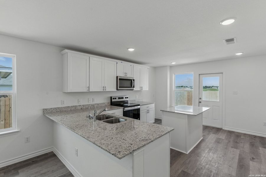 Furnished interior view inside a new home in Davis Ranch, San Antonio (Image 9).