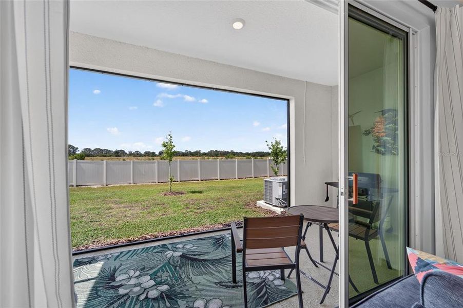 Exterior details and patio area of a home in Mangrove Point, Apollo Beach (Image 28).