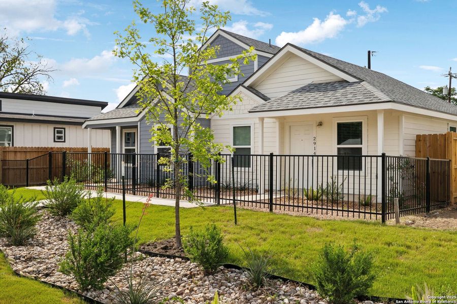 Front exterior of a new home in , San Antonio, TX, highlighting curb appeal (Image 13).