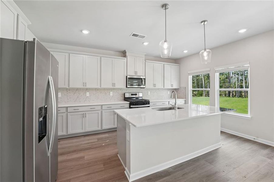 Furnished interior view inside a new home in Northwoods at Mirror Lake, Villa Rica (Image 7).