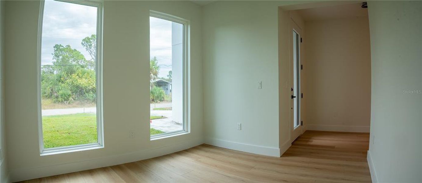 Spacious, unfurnished interior of a new home in , Port Charlotte (Image 29).