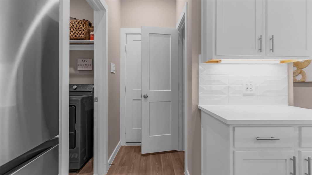 Laundry, Garage Entry and large pantry.