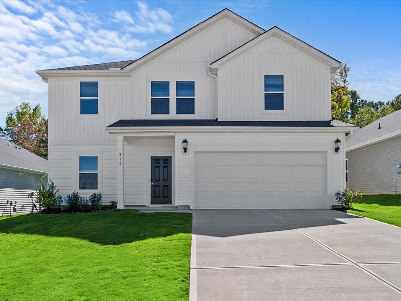 Front exterior of a new home in Vickery Station, Woodruff, SC, highlighting curb appeal (Image 1).