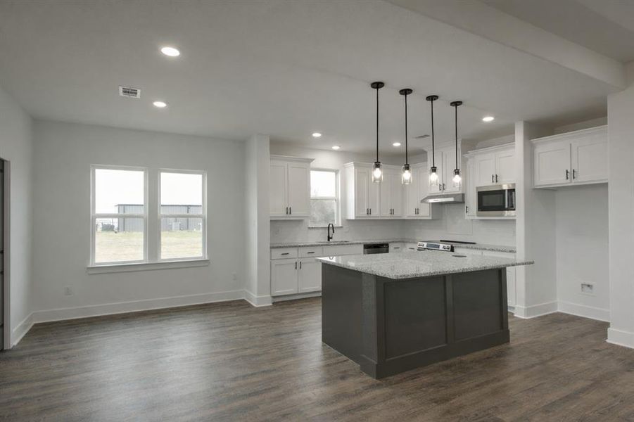 Furnished interior view inside a new home in , Sadler (Image 8).